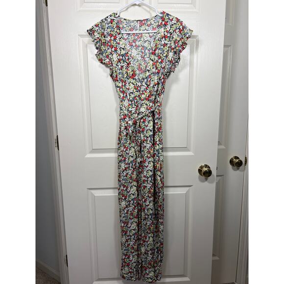 Free People Ruffle Your Feathers Print Jumpsuit Deep V Neck Pockets XS Boho - Picture 2 of 13